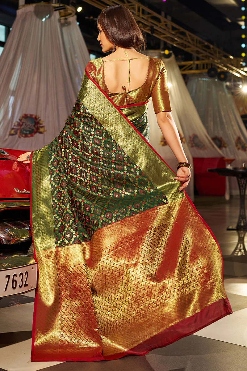 Beauteous Dark Green Patola Silk Saree with Pleasant Blouse Piece - Image 4