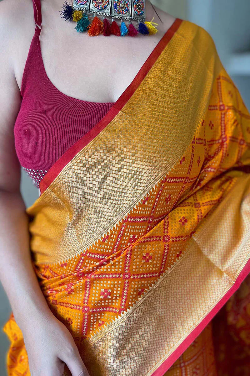Beauteous Mustard Patola Silk Saree with Delectable Blouse Piece - Image 2