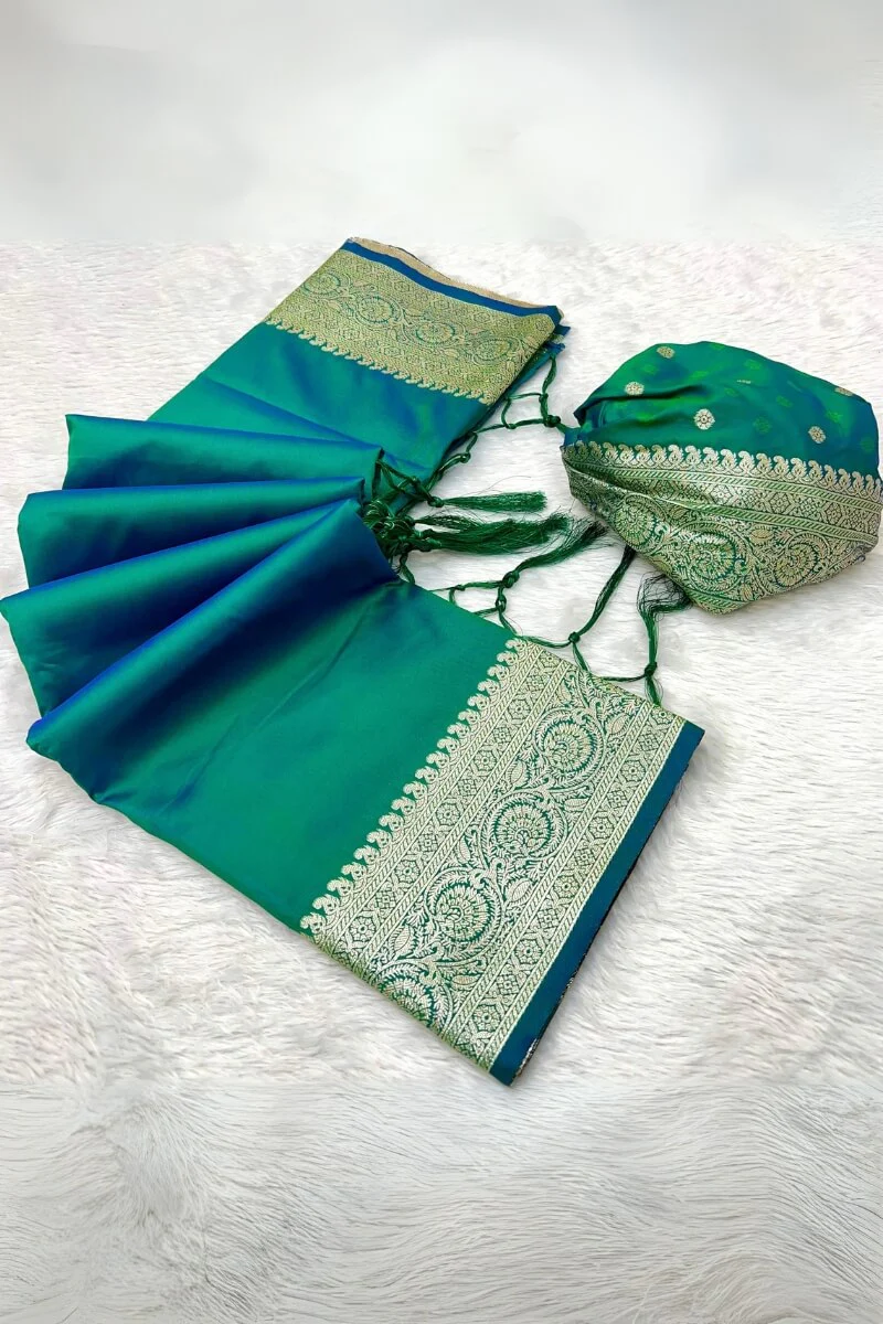 Cynosure Rama Soft Banarasi Silk Saree With Panache Blouse Piece