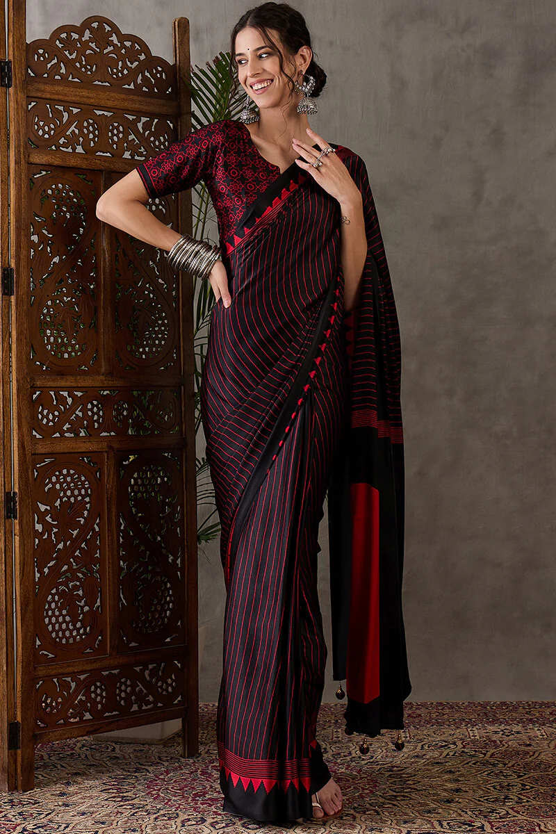 Diaphanous Black Ajrakh Printed Semi Modal Silk Saree With Majestic Blouse Piece