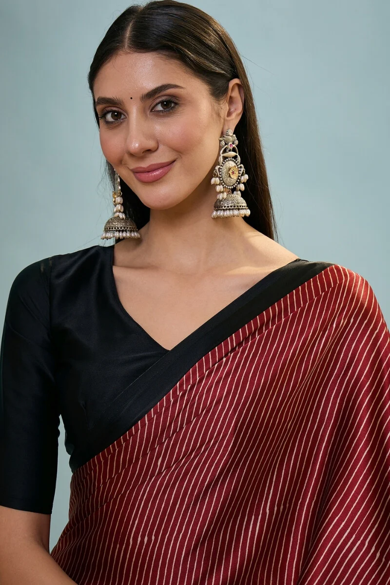 Enthralling Maroon Ajrakh Printed Semi Modal Silk Saree With Desuetude Blouse Piece - Image 2
