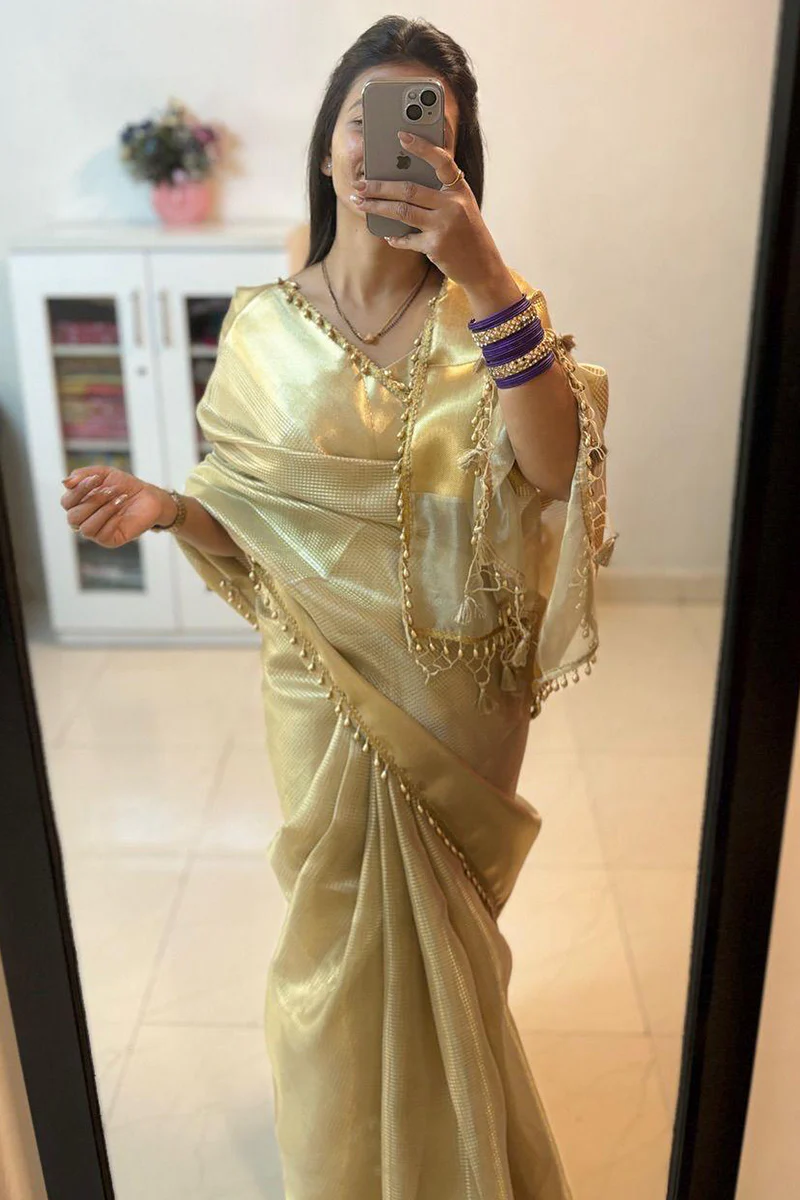 Fancifull Golden Soft Tissue Silk Saree With Demesne Blouse Piece - Image 3