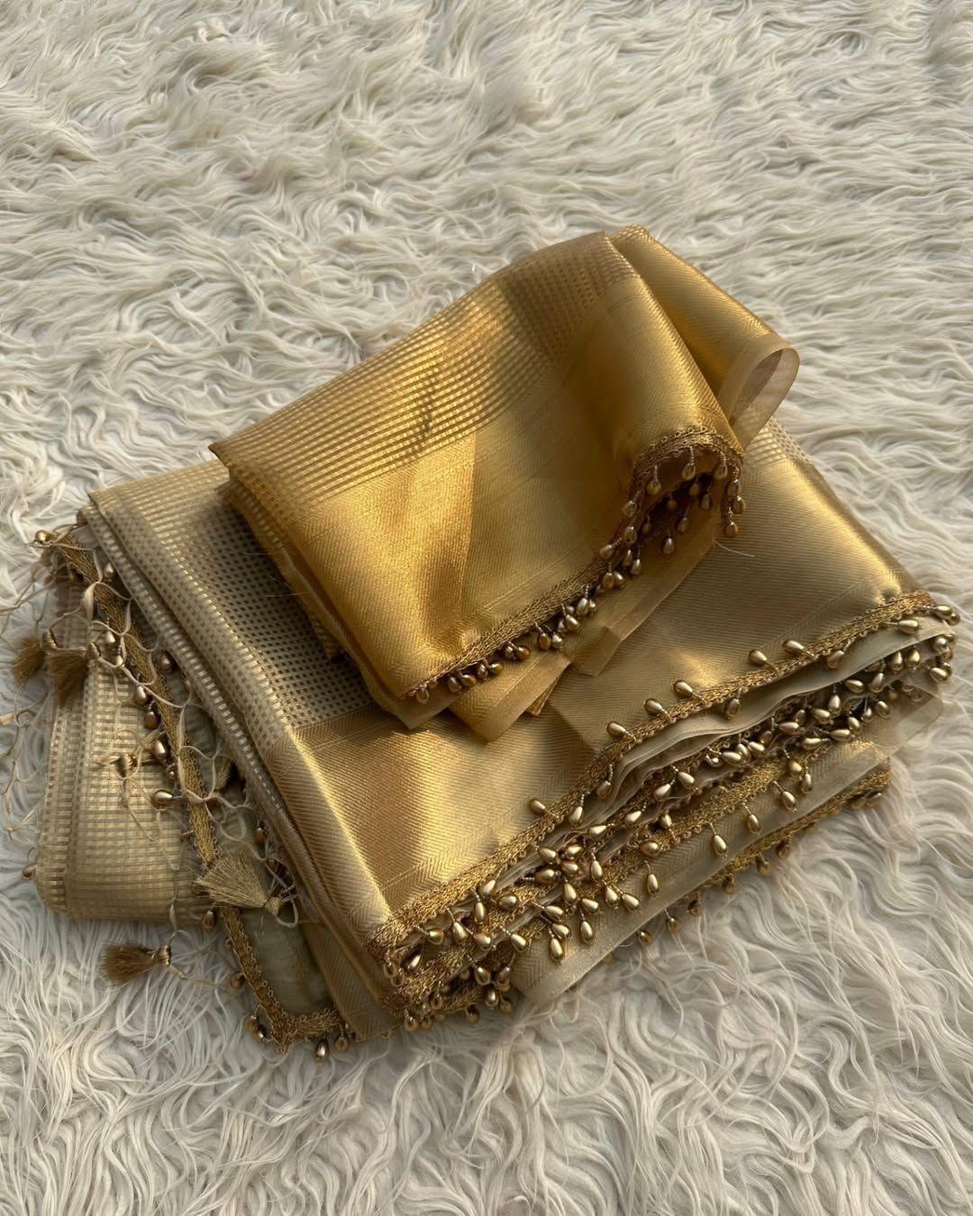 Fancifull Golden Soft Tissue Silk Saree With Demesne Blouse Piece - Image 4