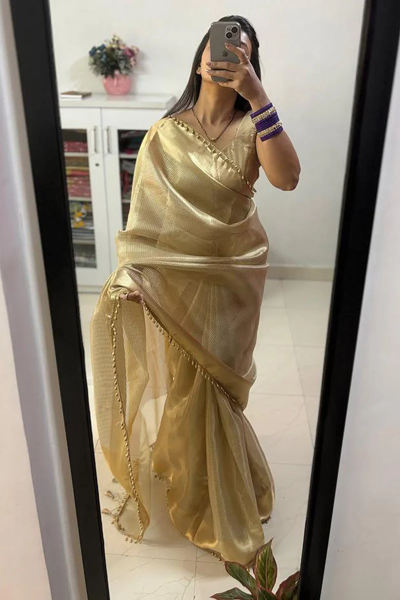 Fancifull Golden Soft Tissue Silk Saree With Demesne Blouse Piece - Image 5
