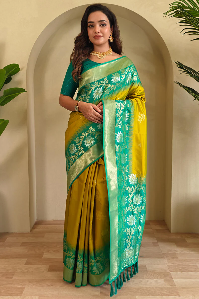 Flaunt Mustard Soft Banarasi Silk Saree With Inimitable Blouse Piece