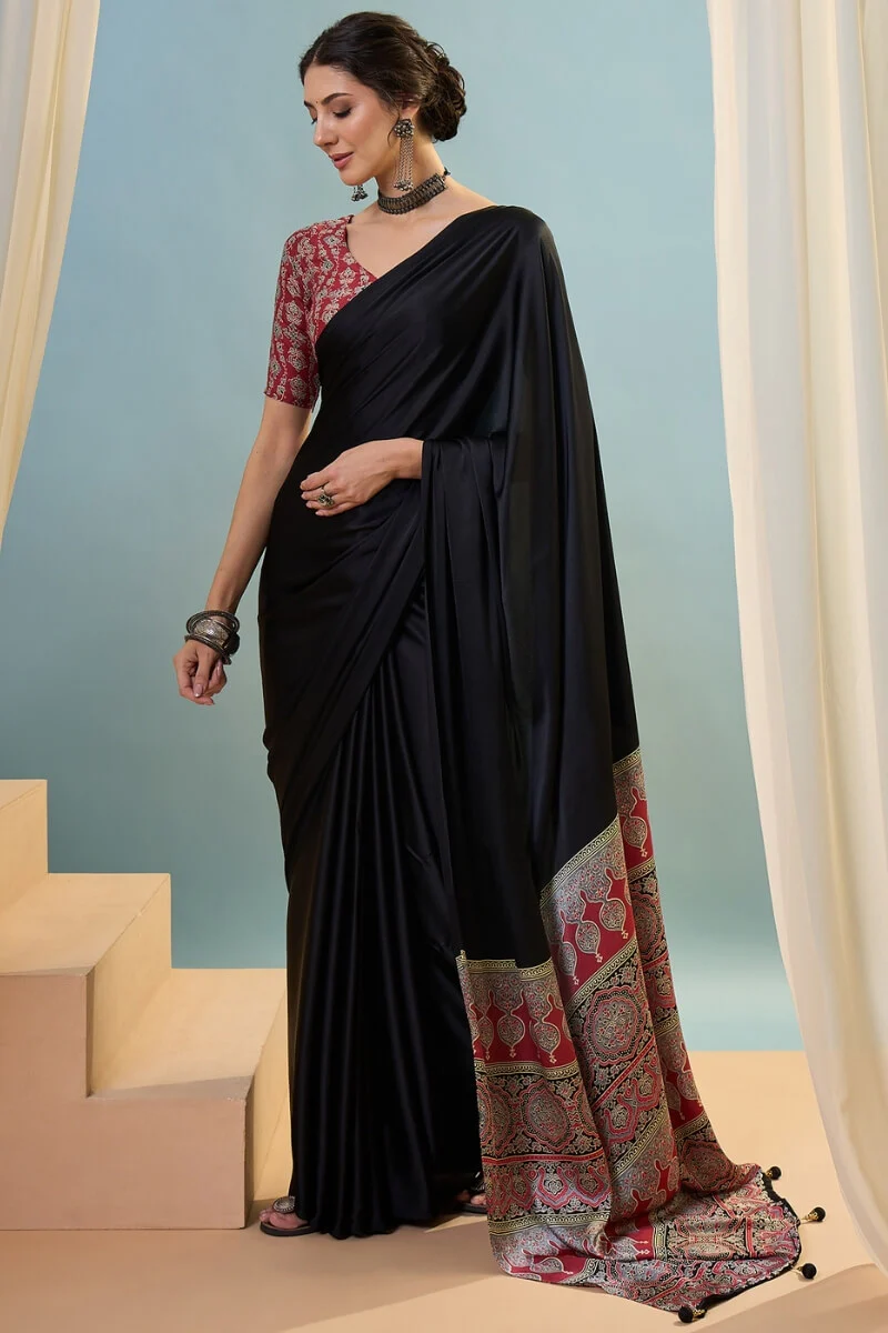 Innovative Black Ajrakh Printed Semi Modal Silk Saree With Snazzy Blouse Piece - Image 2