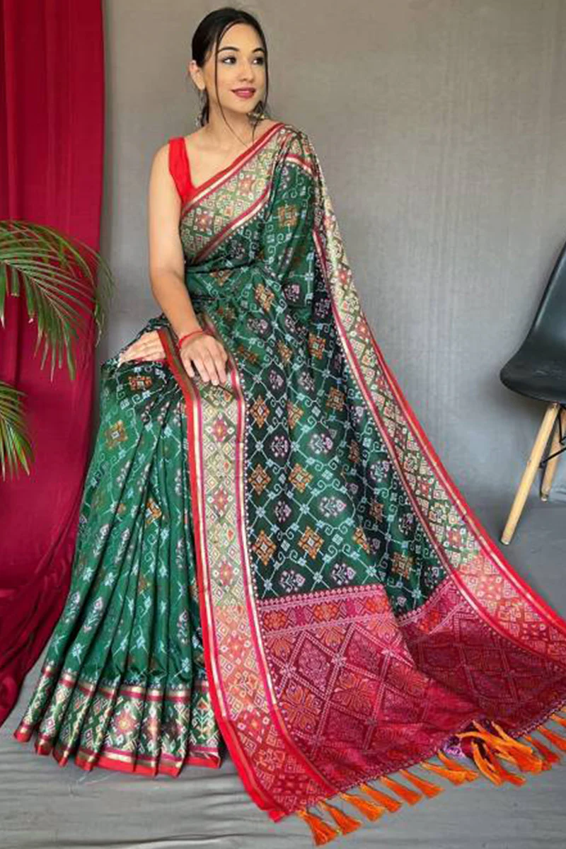 Jazzy Dark Green Patola Silk Saree with Cynosure Blouse Piece - Image 3