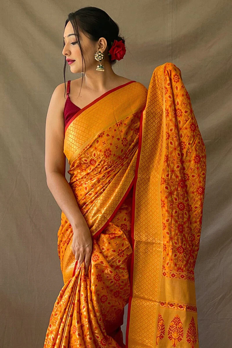 Jubilant Mustard Patola Silk Saree with Lovely Blouse Piece - Image 2