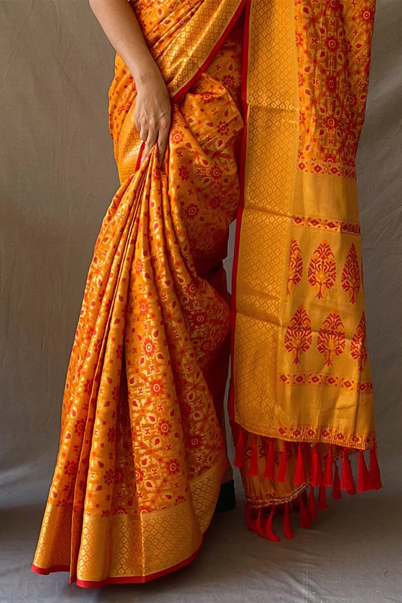 Jubilant Mustard Patola Silk Saree with Lovely Blouse Piece - Image 4