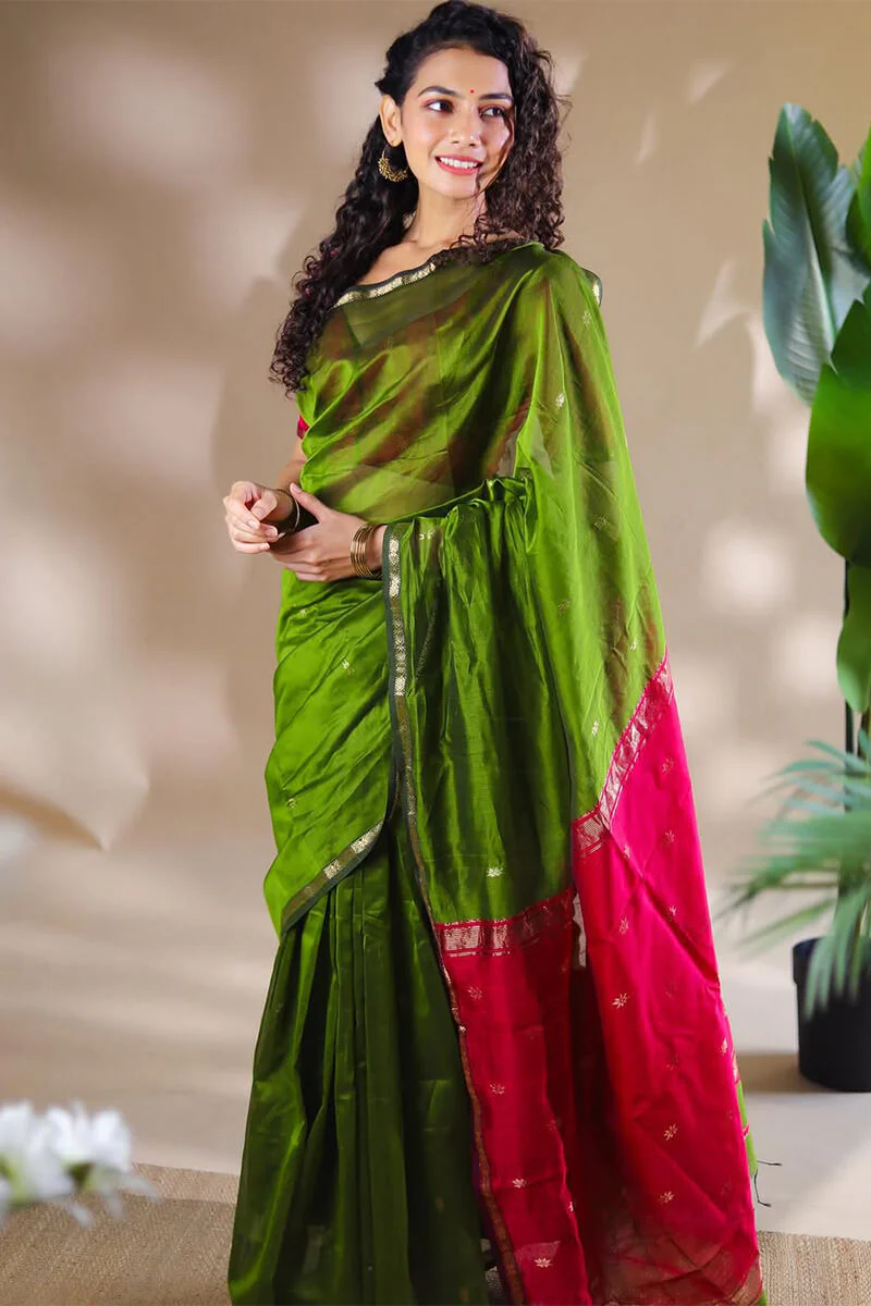 Opulent Green Cotton Silk Saree With Demanding Blouse Piece