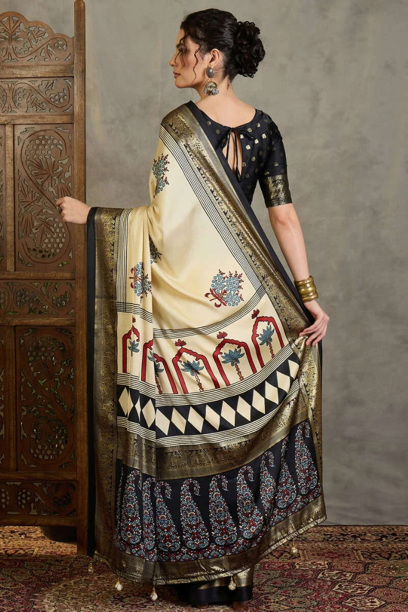 Pulsating Off White Ajrakh Printed Semi Modal Silk Saree With Forbearance Blouse Piece - Image 7