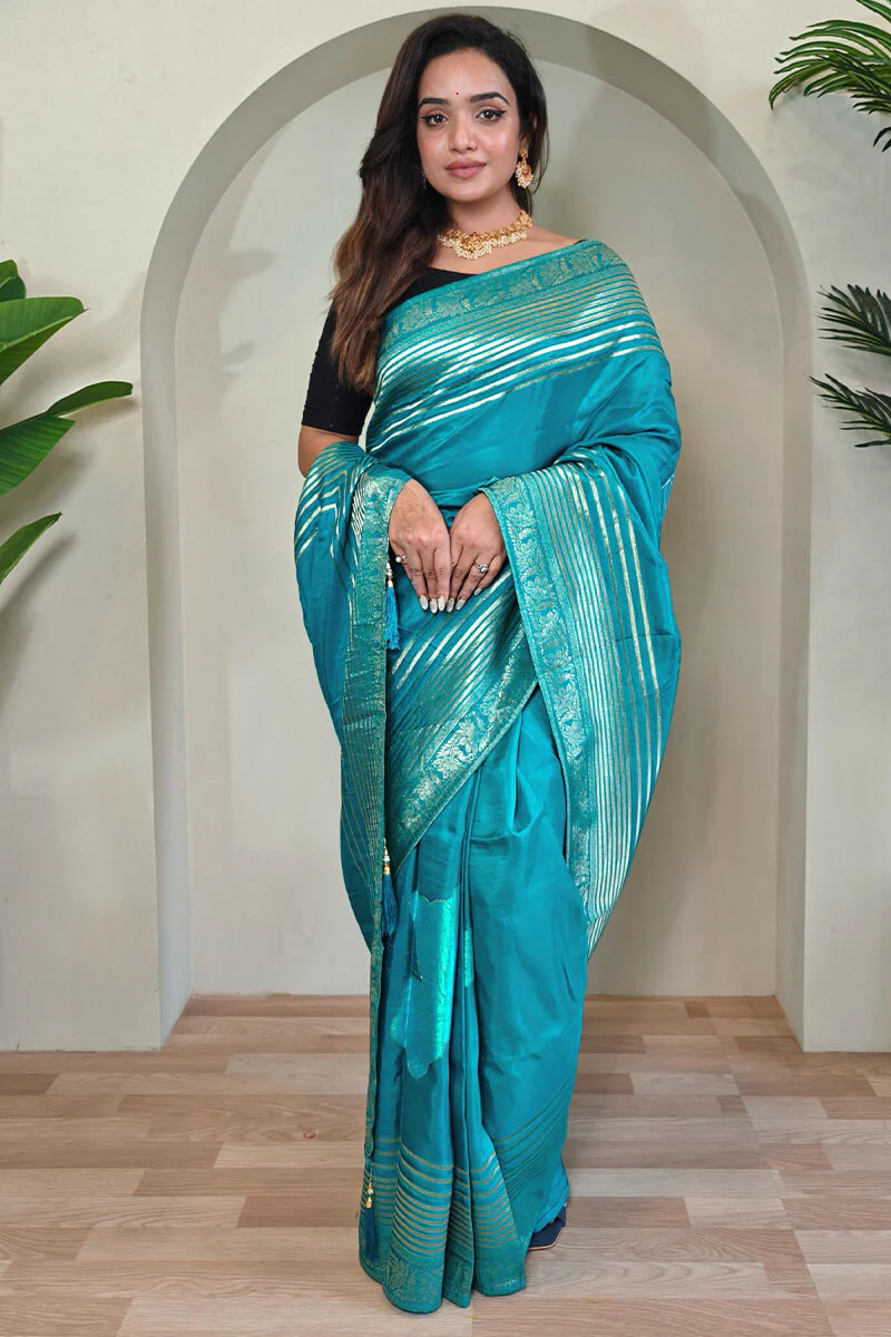 Staring Firozi Soft Banarasi Silk Saree With Jazzy Blouse Piece - Image 3